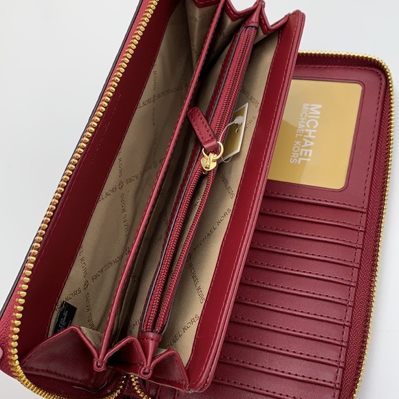 MICHAEL KORS
Leather Continental Wristlet Phone Case Wallet 
Oxblood 
NWT - Picture 5 of 16